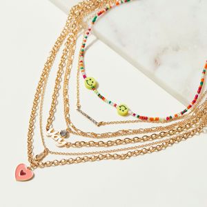 Metallic Gold Multi-Layer Necklace with Pendants