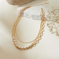 Metallic Multi-Layer Necklace with Pearls