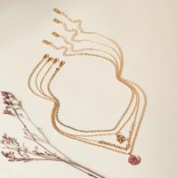 Embellished 4-Piece Multi-Layer Necklace with Pendants and Lobster Clasp