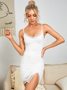 YOINS Spaghetti Embroidered Backless design lace Trim Slit Hem Mini Dress