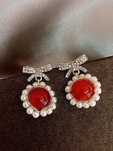 Fashion inlaid diamond bow earrings