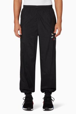 Adicolor Swirl Trefoil Trackpants in Primegreen Nylon Adicolor Swirl Trefoil Trackpants in Primegreen Nylon